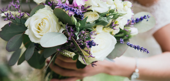 Wedding bouquet in the hand of a bride